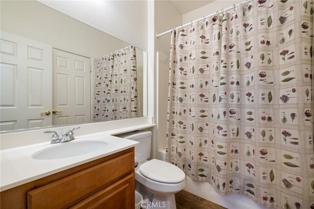 6411 Puma Pl, Rancho Cucamonga, CA 91737 - bathroom featuring vanity, shower / tub combo with curtain, and tile patterned floors