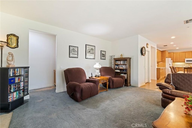 6411 Puma Pl, Rancho Cucamonga, CA 91737 - living area featuring light carpet and recessed lighting