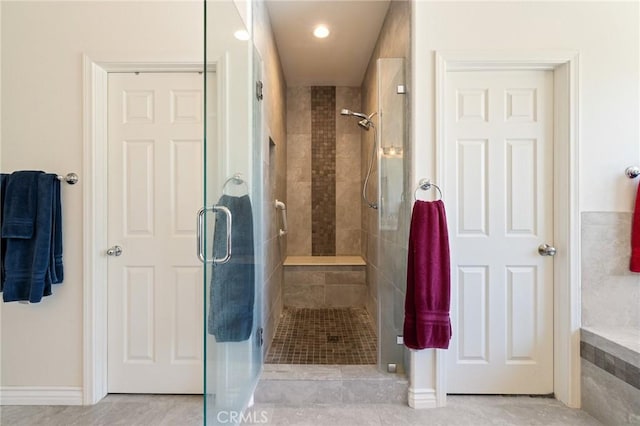 6411 Puma Pl, Rancho Cucamonga, CA 91737 - bathroom featuring a stall shower and recessed lighting