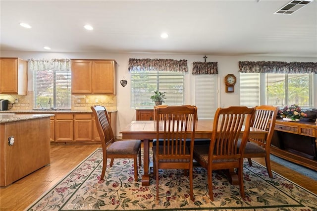 6411 Puma Pl, Rancho Cucamonga, CA 91737 - dining area featuring plenty of natural light, light wood-style floors, and recessed lighting