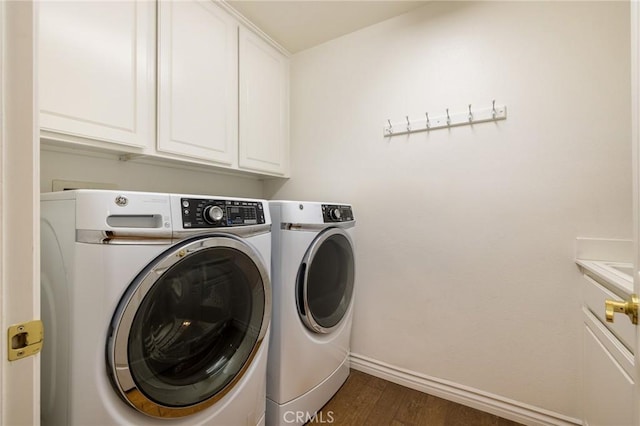 6411 Puma Pl, Rancho Cucamonga, CA 91737 - laundry room with washing machine and clothes dryer, cabinet space, and dark wood finished floors