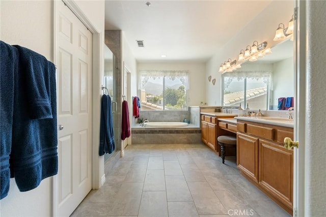 6411 Puma Pl, Rancho Cucamonga, CA 91737 - full bath featuring vanity, a garden tub, and tile patterned flooring