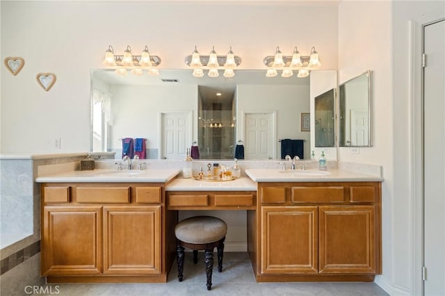 6411 Puma Pl, Rancho Cucamonga, CA 91737 - bathroom with a shower stall, double vanity, and tile patterned flooring