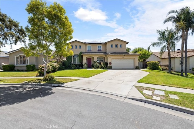 6411 Puma Pl, Rancho Cucamonga, CA 91737 - view of front of house with driveway, a front lawn, stucco siding, and a garage