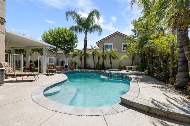 6411 Puma Pl, Rancho Cucamonga, CA 91737 - view of pool with a patio, a fenced backyard, and a pool with connected hot tub