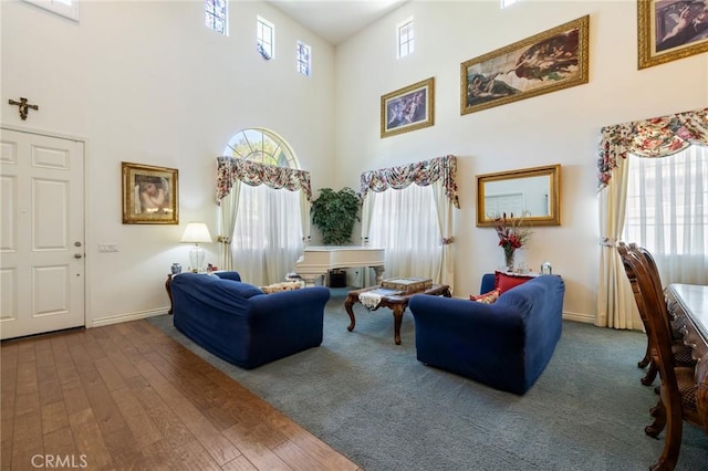 6411 Puma Pl, Rancho Cucamonga, CA 91737 - living area featuring a high ceiling and wood finished floors