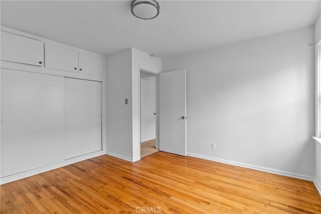 12319 Aneta St, Culver City, CA 90230 - unfurnished bedroom featuring light wood-style floors and a closet