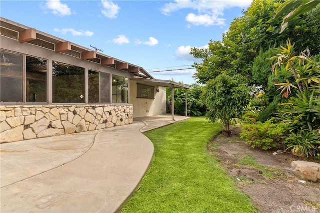 12319 Aneta St, Culver City, CA 90230 - view of grassy yard with a patio