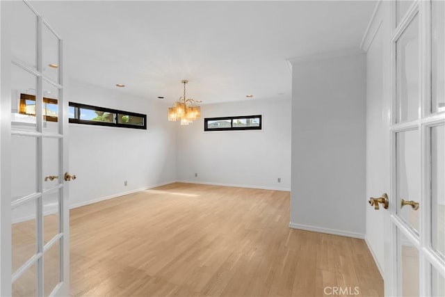 12319 Aneta St, Culver City, CA 90230 - unfurnished room with a chandelier, light wood-type flooring, and recessed lighting