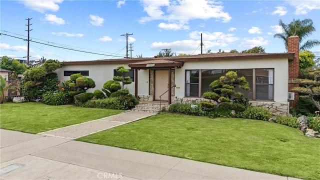 12319 Aneta St, Culver City, CA 90230 - ranch-style house featuring stucco siding, a chimney, a front lawn, and stone siding