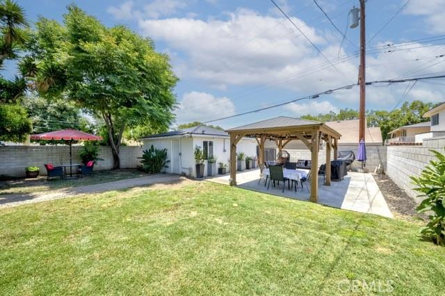 7933 Washington Ave, Whittier, CA 90602 - fenced backyard with a gazebo and a patio