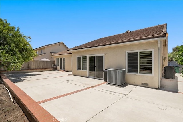 39 Foxhill, Irvine, CA 92604 - rear view of property with stucco siding and a patio