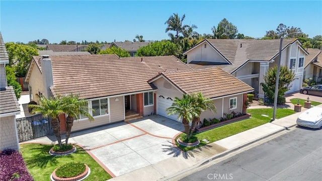 39 Foxhill, Irvine, CA 92604 - single story home with a tiled roof, driveway, an attached garage, stucco siding, and a front lawn