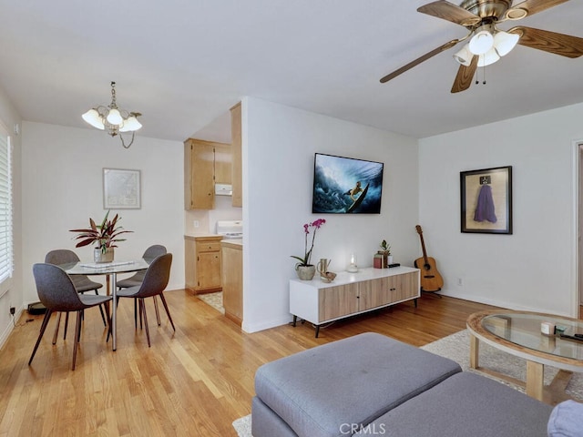 3042 E 3rd St Unit 5, Long Beach, CA 90814 - living room featuring light wood-style flooring, a chandelier, and ceiling fan