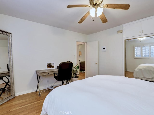 3042 E 3rd St Unit 5, Long Beach, CA 90814 - bedroom with light wood-style floors and a ceiling fan