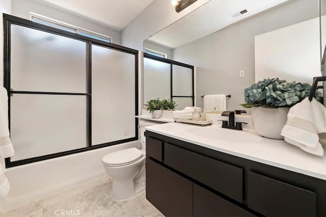 3920 Roxbury Dr, Hemet, CA 92545 - bathroom featuring vanity and bath / shower combo with glass door
