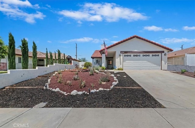 3920 Roxbury Dr, Hemet, CA 92545 - view of front of property featuring a tiled roof, an attached garage, driveway, and stucco siding