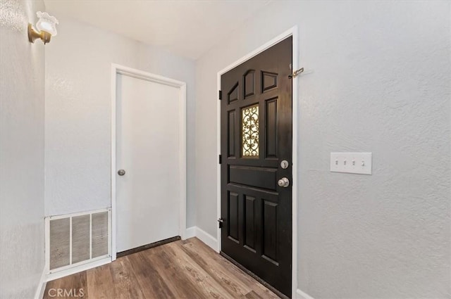 3920 Roxbury Dr, Hemet, CA 92545 - entrance foyer with wood finished floors and baseboards