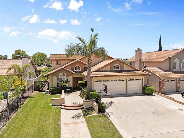 20241 Edmund Rd, Riverside, CA 92508 - mediterranean / spanish-style home with an attached garage, stucco siding, driveway, and a tile roof