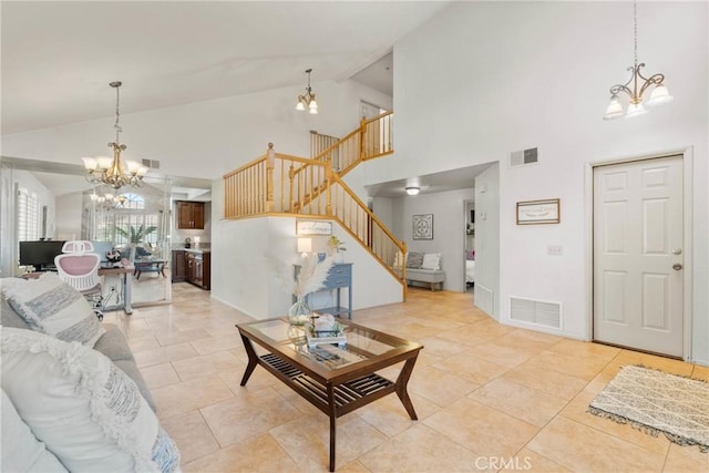 20241 Edmund Rd, Riverside, CA 92508 - living room featuring a chandelier, stairway, high vaulted ceiling, and light tile patterned floors