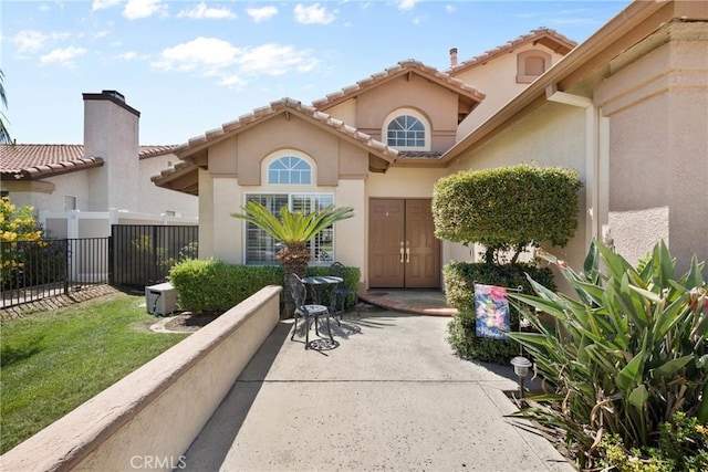 20241 Edmund Rd, Riverside, CA 92508 - entrance to property with stucco siding and a tiled roof