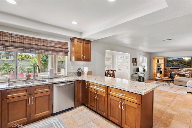 20241 Edmund Rd, Riverside, CA 92508 - kitchen featuring dishwasher, a peninsula, brown cabinetry, healthy amount of natural light, and recessed lighting