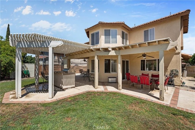 20241 Edmund Rd, Riverside, CA 92508 - rear view of house with a ceiling fan, a pergola, stucco siding, a patio, and a tile roof