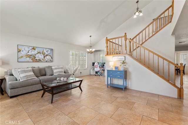 20241 Edmund Rd, Riverside, CA 92508 - living area featuring a chandelier, high vaulted ceiling, healthy amount of natural light, and stairs