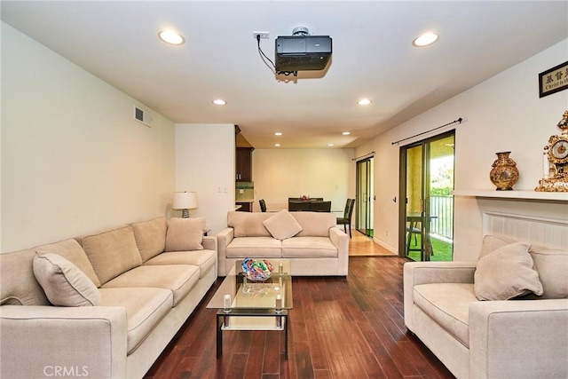 535 W Duarte Rd Unit 14, Arcadia, CA 91007 - living area with dark wood-style floors, recessed lighting, and a fireplace