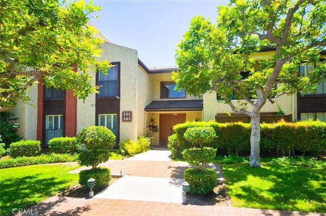535 W Duarte Rd Unit 14, Arcadia, CA 91007 - view of front of house featuring stucco siding and a front yard