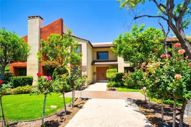 535 W Duarte Rd Unit 14, Arcadia, CA 91007 - view of front of property with a chimney, stucco siding, and a front yard