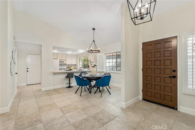 43791 Calle Las Brisas W, Palm Desert, CA 92211 - entryway with a chandelier and high vaulted ceiling
