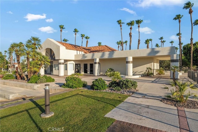 43791 Calle Las Brisas W, Palm Desert, CA 92211 - view of front of home featuring stucco siding and french doors