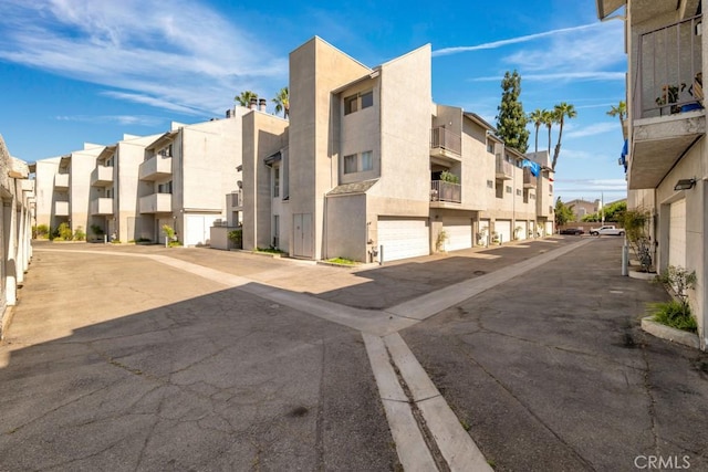 20155 Keswick St Unit 211, Winnetka, CA 91306 - view of asphalt road featuring a residential view