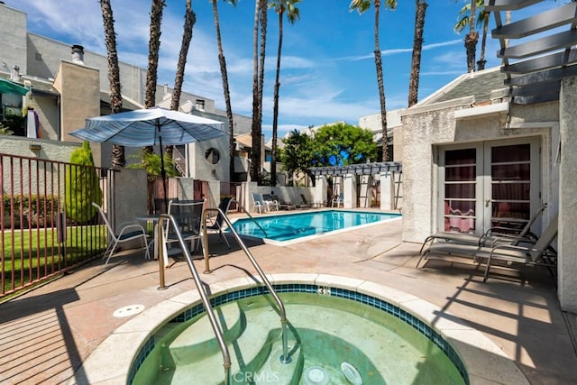20155 Keswick St Unit 211, Winnetka, CA 91306 - community pool with a hot tub, french doors, and a patio