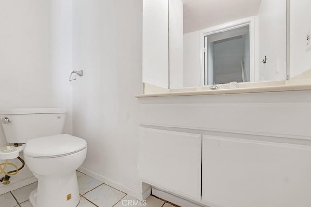 20155 Keswick St Unit 211, Winnetka, CA 91306 - half bathroom featuring vanity and tile patterned flooring