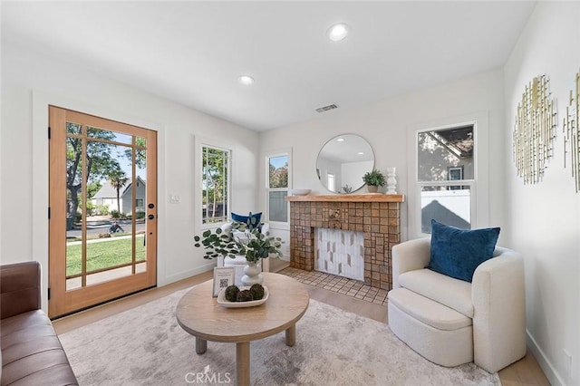 1951 Wagner St, Pasadena, CA 91107 - living room featuring a brick fireplace, recessed lighting, and light wood finished floors