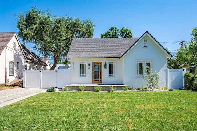 1951 Wagner St, Pasadena, CA 91107 - english style home featuring a gate, stucco siding, a shingled roof, and covered porch
