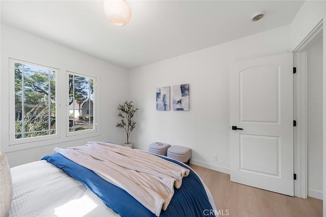 1951 Wagner St, Pasadena, CA 91107 - bedroom with light wood-type flooring and baseboards