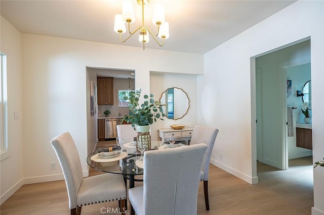 1951 Wagner St, Pasadena, CA 91107 - dining space with light wood finished floors and a chandelier