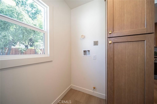 1951 Wagner St, Pasadena, CA 91107 - laundry area featuring light wood-style flooring, hookup for a washing machine, and plenty of natural light