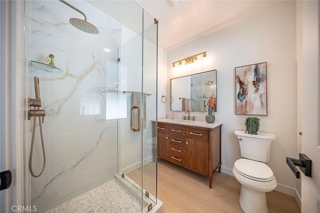 1951 Wagner St, Pasadena, CA 91107 - bathroom featuring a marble finish shower, vanity, and wood finished floors