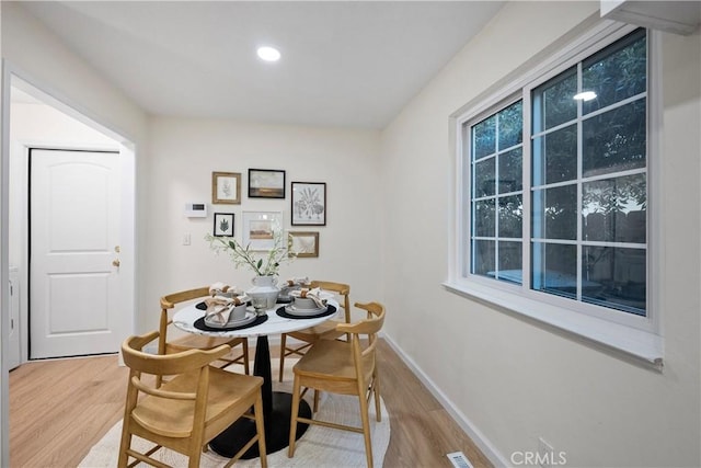 6330 N Wilson Ave, Fresno, CA 93704 - dining room featuring light wood-style floors and recessed lighting