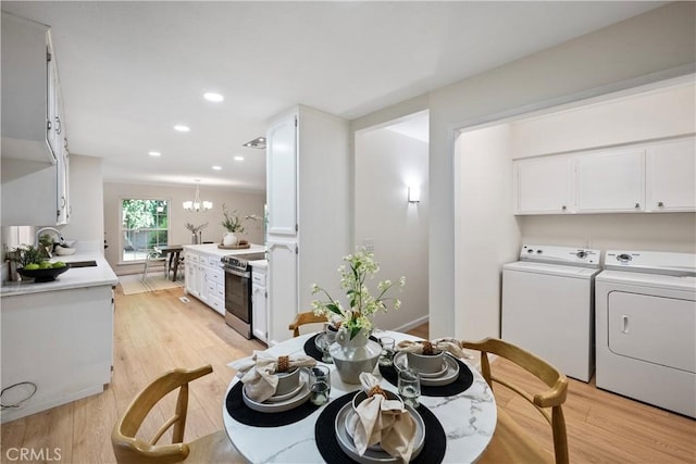 6330 N Wilson Ave, Fresno, CA 93704 - dining space with separate washer and dryer, light wood-style flooring, recessed lighting, and a chandelier