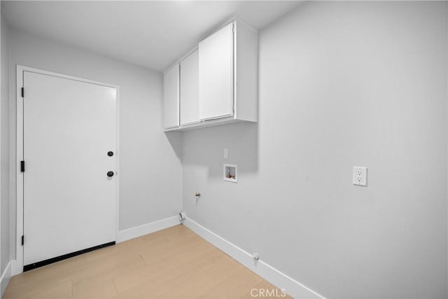 9211 Regency Way, Rancho Cucamonga, CA 91701 - washroom with gas dryer hookup, cabinet space, washer hookup, and light wood-type flooring