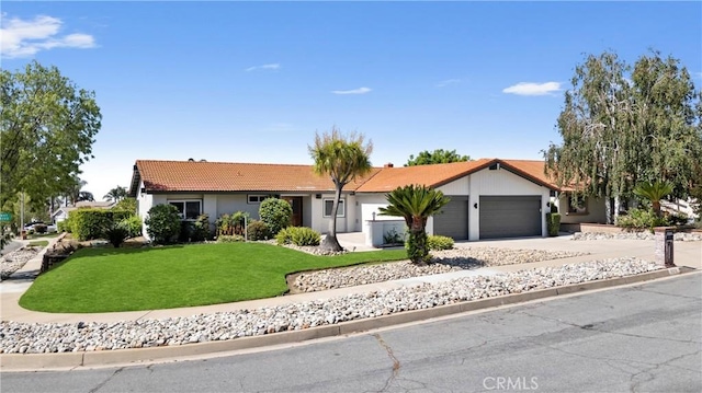 9211 Regency Way, Rancho Cucamonga, CA 91701 - ranch-style house featuring a garage, a tiled roof, a front yard, concrete driveway, and stucco siding