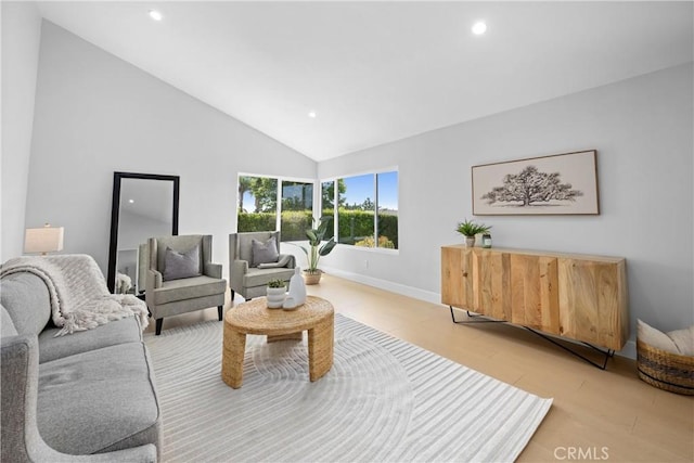 9211 Regency Way, Rancho Cucamonga, CA 91701 - living area with recessed lighting, light wood-style flooring, and high vaulted ceiling