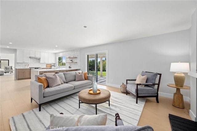 9211 Regency Way, Rancho Cucamonga, CA 91701 - living area featuring recessed lighting and baseboards
