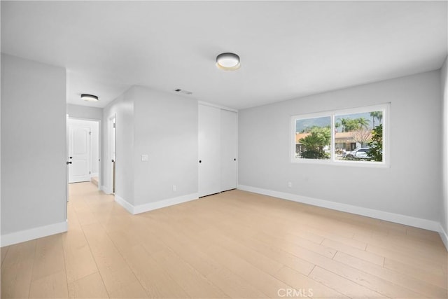 9211 Regency Way, Rancho Cucamonga, CA 91701 - empty room featuring baseboards and light wood-style flooring