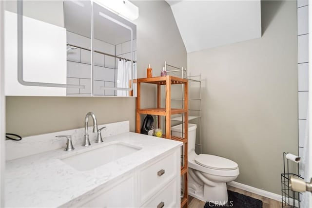 43657 21st St W, Lancaster, CA 93536 - full bathroom with wood finished floors, vanity, and a shower with shower curtain